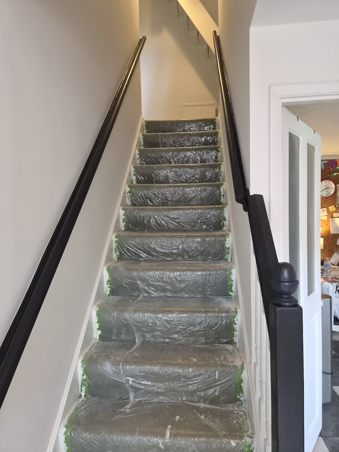 Decorated staircase and hallway in a home
